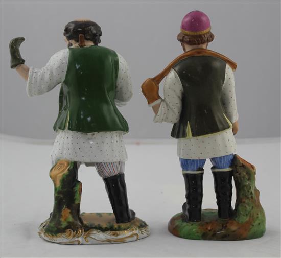 Two porcelain figures of a water carrier and a peasant